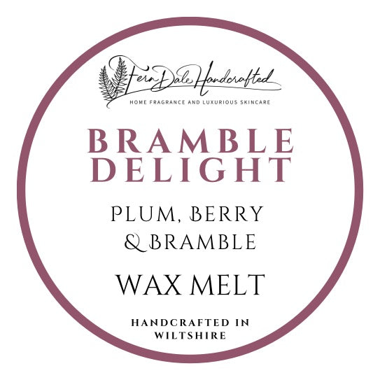 Bramble Delight wax melt label with a plum-coloured circular border, fern logo and 'Handcrafted in Wiltshire' text.