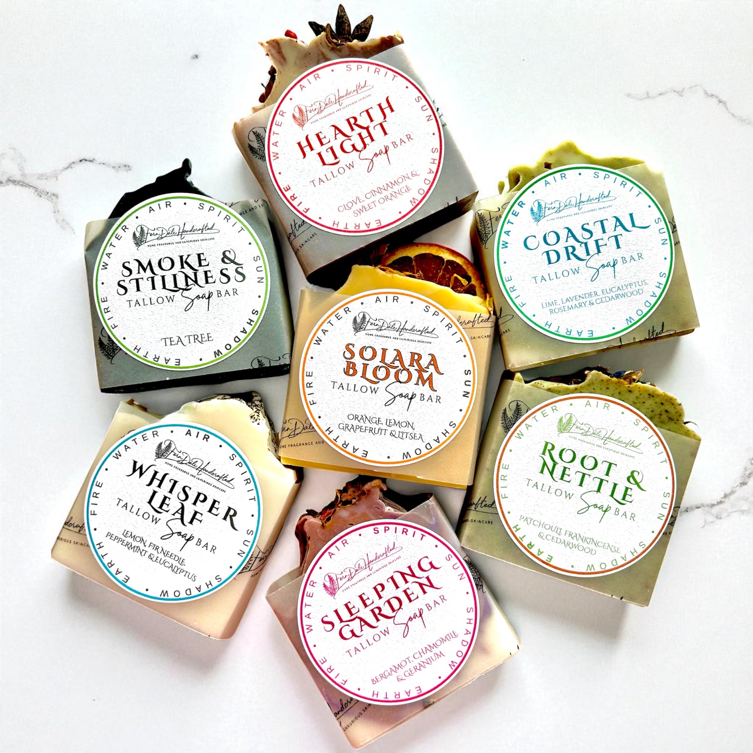 Full Ceremony Set - Elemental Ritual Tallow Soap Collection with seven paper-wrapped bars bearing round labels.
