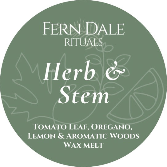 Herb & Stem round green wax melt label with white lettering and pale outlines of leaves and a citrus slice.