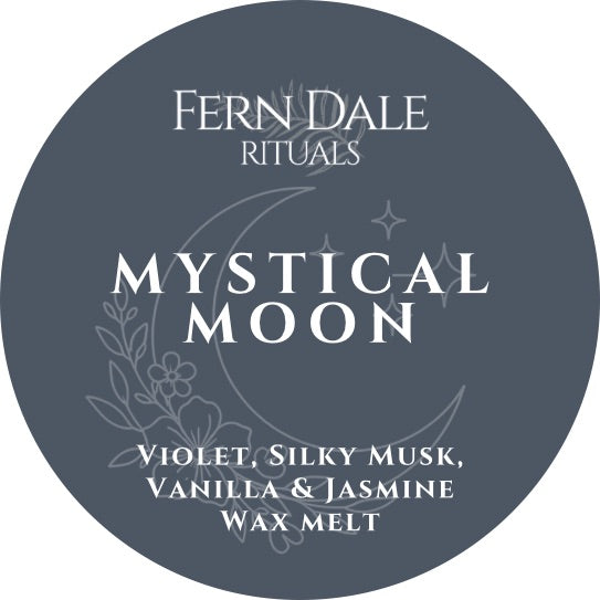 Mystical Moon round slate-grey wax melt label with white lettering, a crescent moon, flowers and stars.