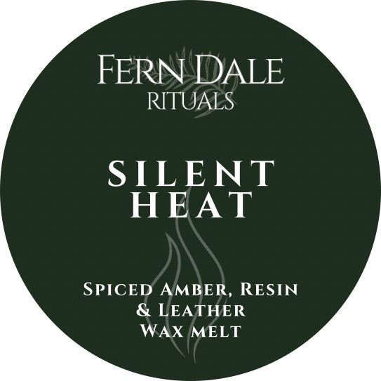 Silent Heat wax melt label in dark green with white lettering and a grey flame design.