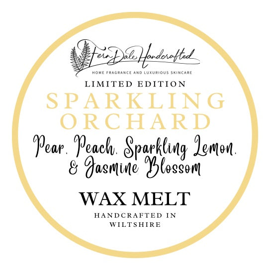 Sparkling Orchard circular wax melt label with a pale gold border, gold lettering and black script on white.